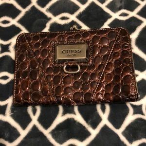 Guess hand purse ,  brown color